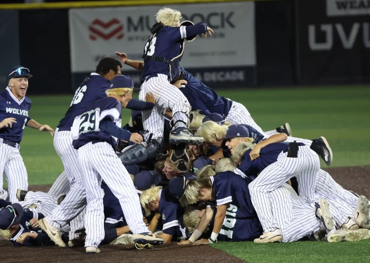Timpanogos players celebrating together on the field