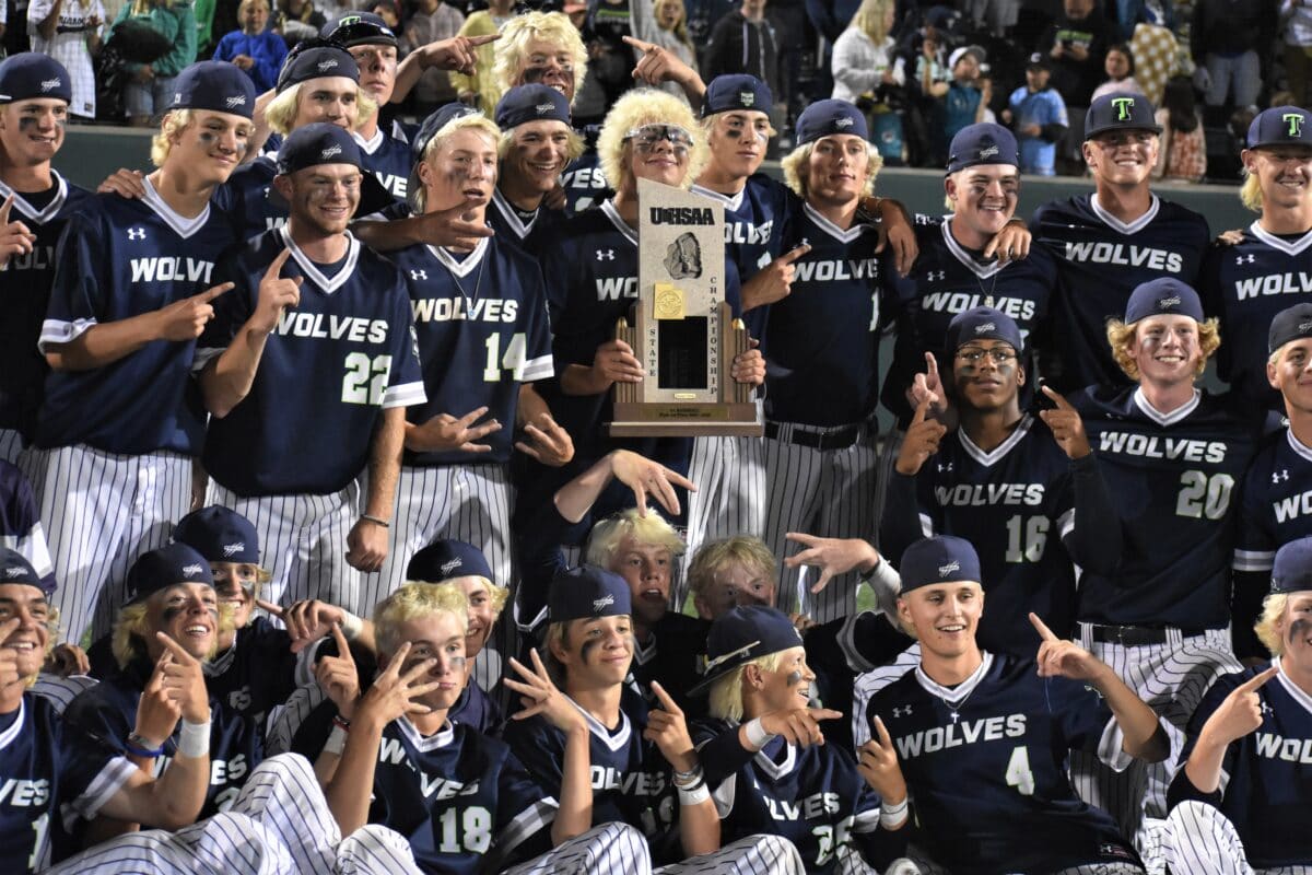 Timpanogos players holding the state championship trophy